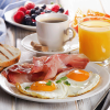 breakfast eggs bacon toast juice coffee
