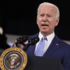 President Joseph Biden speaking at podium